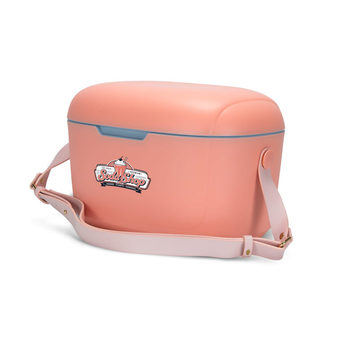 Daisy Cooler - A peach-coloured cooler with a light blue handle and a logo on the front, featuring a detachable shoulder strap.