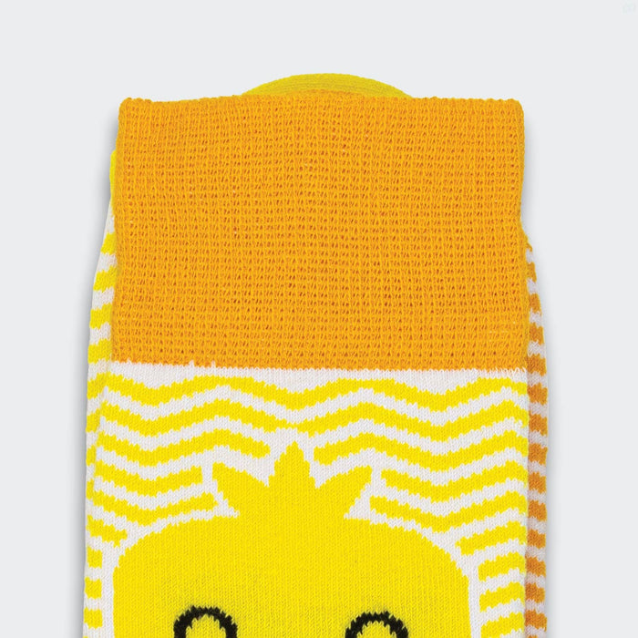 Pixel Knitted Business Socks - Set of 2 - A pair of bright yellow and white knitted socks featuring a playful design and a branded logo.