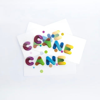 Prism Print - 78 x 48mm Sticker - Colourful, playful sticker letters in varying shades with polka dots on white backing paper.