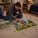 Custom Gift Box Jigsaw Puzzle - A boy assembling a colourful jigsaw puzzle featuring a dog in a vibrant outdoor scene, with a gift box beside him.