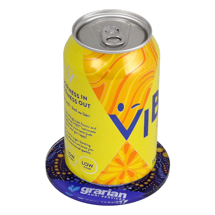 Round Glass Coaster - A drink can sits on a round, purple glass coaster featuring a logo, with vibrant yellow and orange designs.