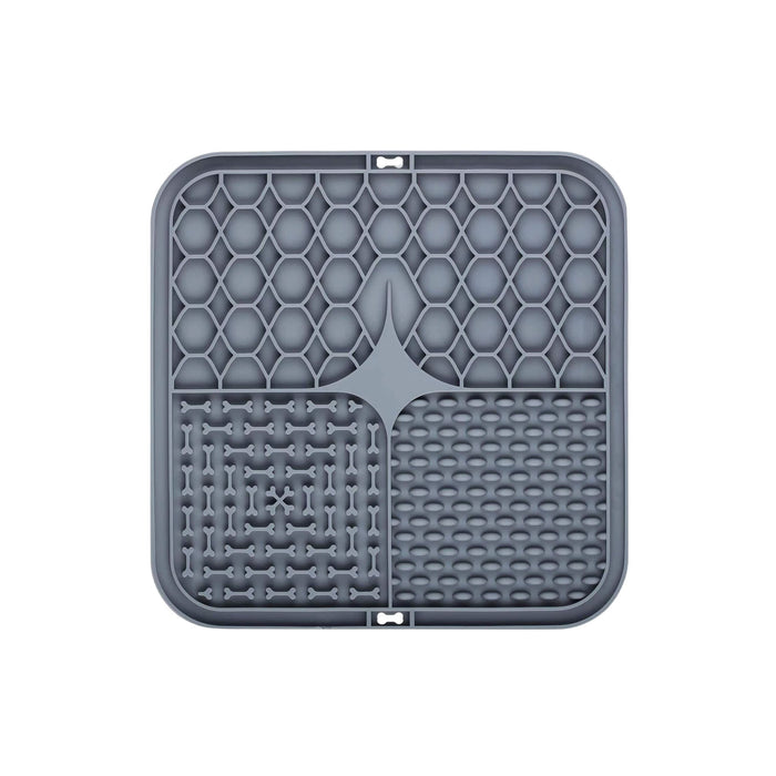 3-Section Dog Enrichment Lick Mat - A grey, 3-section dog enrichment lick mat with various textured patterns for stimulation and engagement.