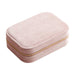 Velvet Jewellery Box with Compartment - A pink velvet jewellery box with a compartment and a gold zipper. It features a soft, textured exterior.