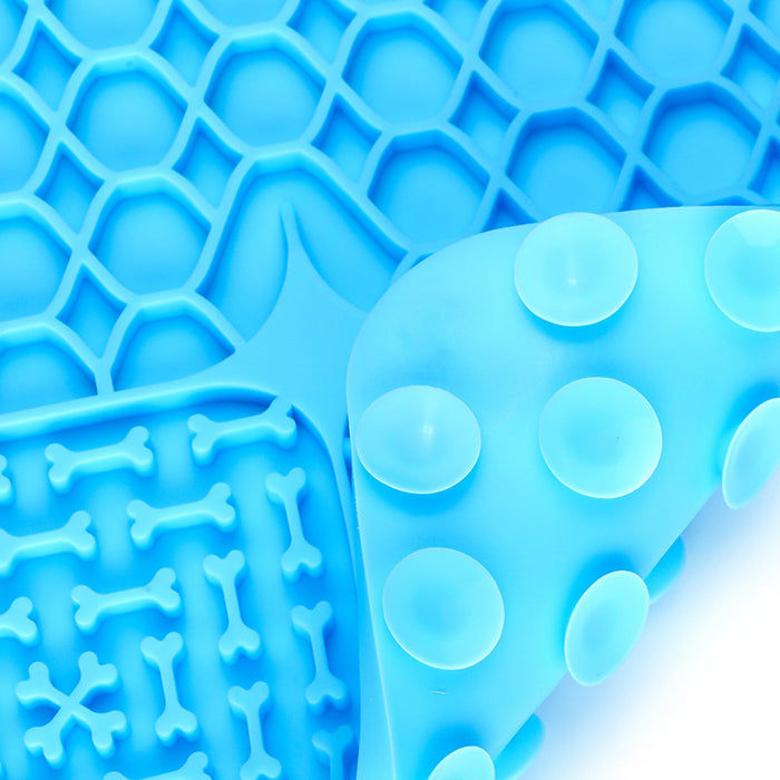 3-Section Dog Enrichment Lick Mat - A blue, three-section silicone lick mat with varied textured patterns including honeycomb, bones, and rounded dots.