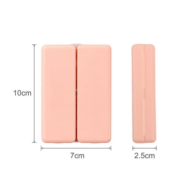 Folding 7 Compartment Pills Box - A pink folding pill box with seven compartments, measuring 10 cm by 7 cm by 2.5 cm, featuring a logo.