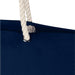 Florida GRS Recycled Beach Tote Bag - A navy blue tote bag with a white rope handle and a metal grommet. It features a subtle branding element.