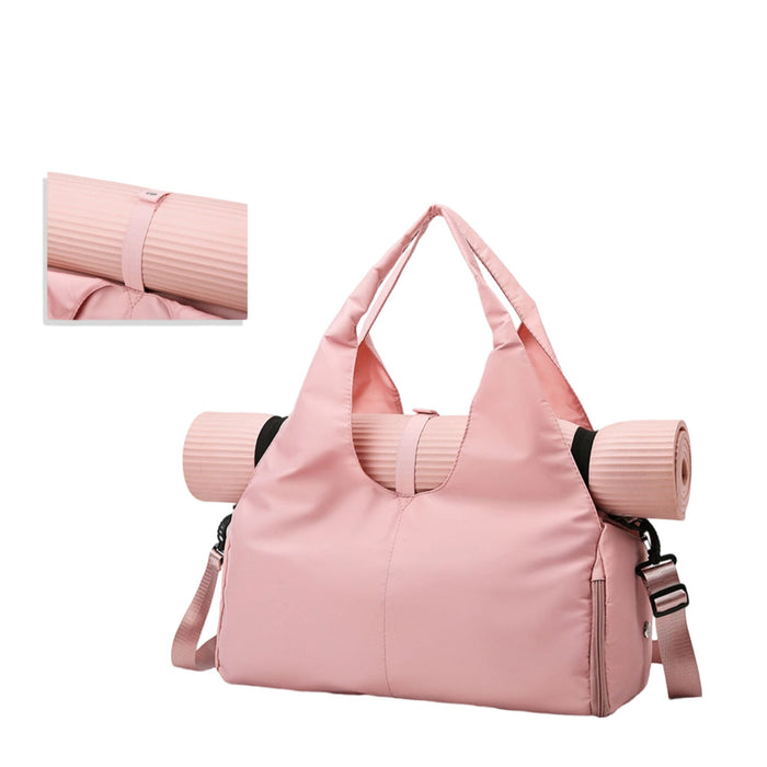 Duffle Bag With Yoga Mat Strap - A pink duffle bag with a yoga mat strap, featuring a large main compartment and adjustable shoulder strap.