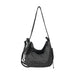 Convertible Lightweight Backpack Duffel Bag - A convertible lightweight backpack duffel bag in black with a grid pattern and multiple straps.