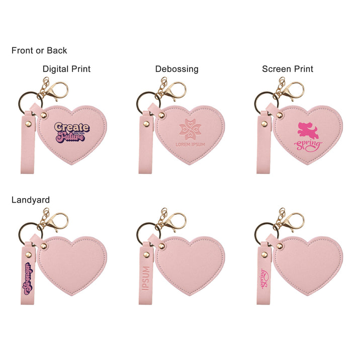 Heart-Shaped Compact Mirror with Keychain - A heart-shaped compact mirror in pink features a keychain, with options for digital print and debossing designs.