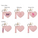 Heart-Shaped Compact Mirror with Keychain - A heart-shaped compact mirror in pink features a keychain, with options for digital print and debossing designs.