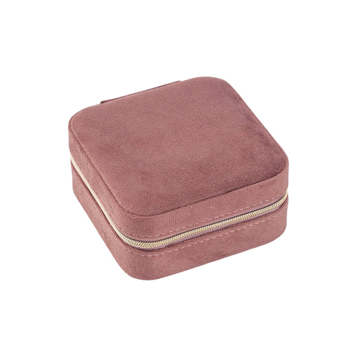 Velvet Jewellery Organizer - A square, soft, pink velvet jewellery organiser with a zip closure. It has a smooth, textured surface.