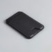 Magnetic Wallet w/ Phone Stand - A black magnetic wallet with a slim design, featuring a phone stand and a branding logo on the surface.