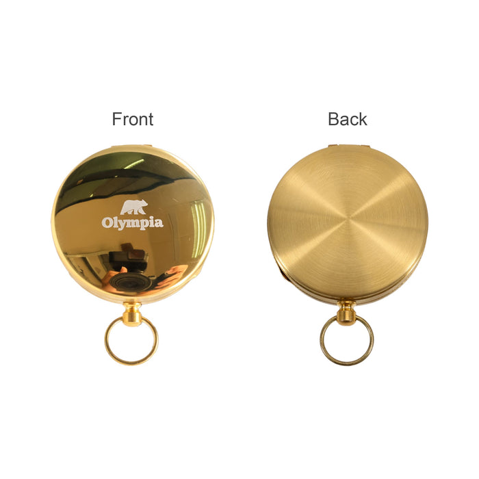 Luminous Compass - A gold pocket watch with a smooth finish, featuring a logo on the front and a plain back.
