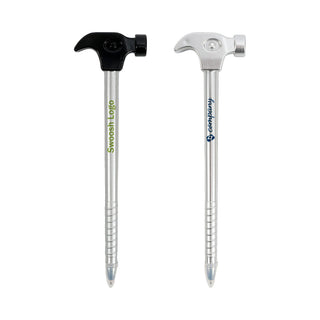 Hammer Shape Ballpoint Pen - A hammer-shaped ballpoint pen in silver with black and green accents, featuring a logo.
