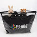 Tote Bag With Detachable PVC Cover - A black tote bag with a detachable PVC cover, featuring two plush toys peeking out from the top.