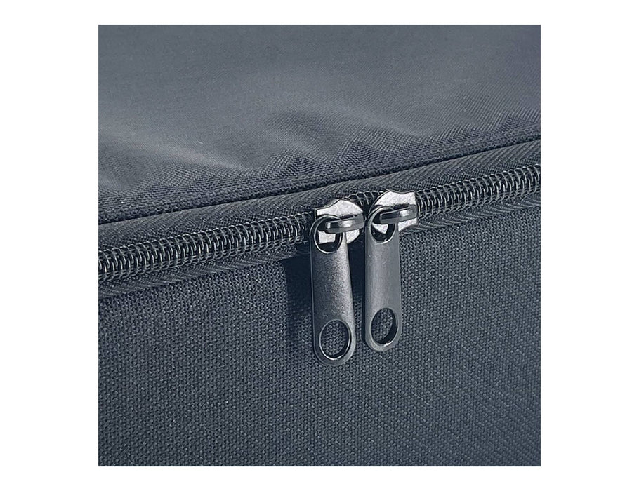 Sachi Insulated Junior XL Lunch Bag - A close-up of a black insulated lunch bag featuring dual zippers and a textured fabric.