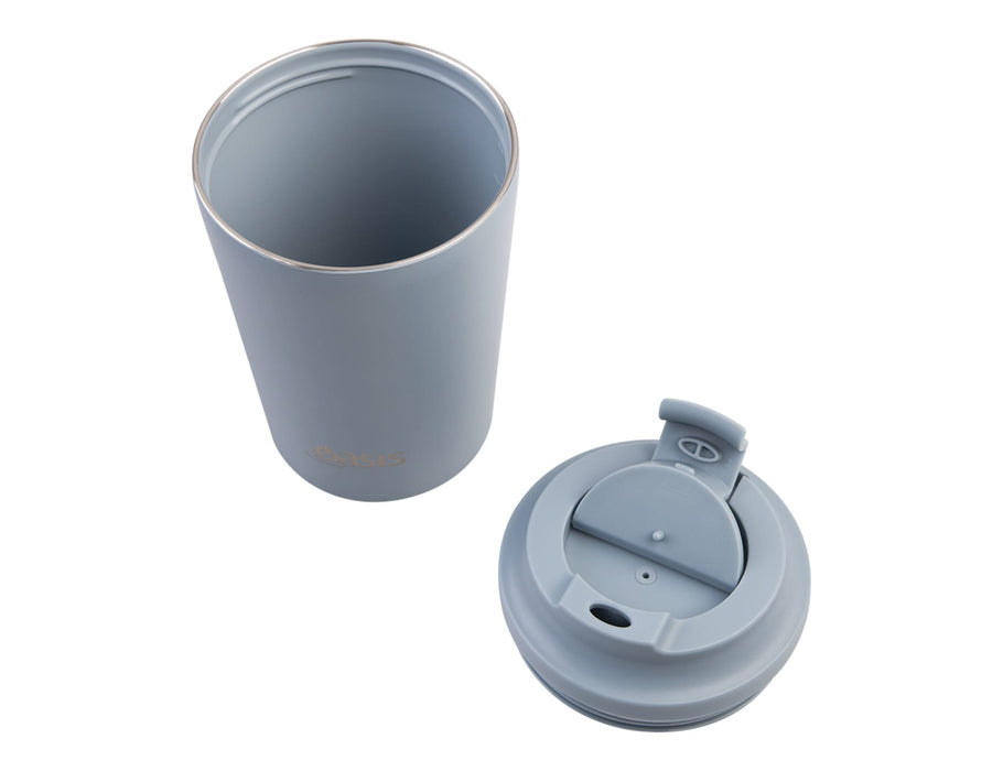Oasis Ceramic Lined 360ml Insulated Coffee Cup - A ceramic lined insulated coffee cup in light blue, featuring a removable lid with a secure opening and a logo.
