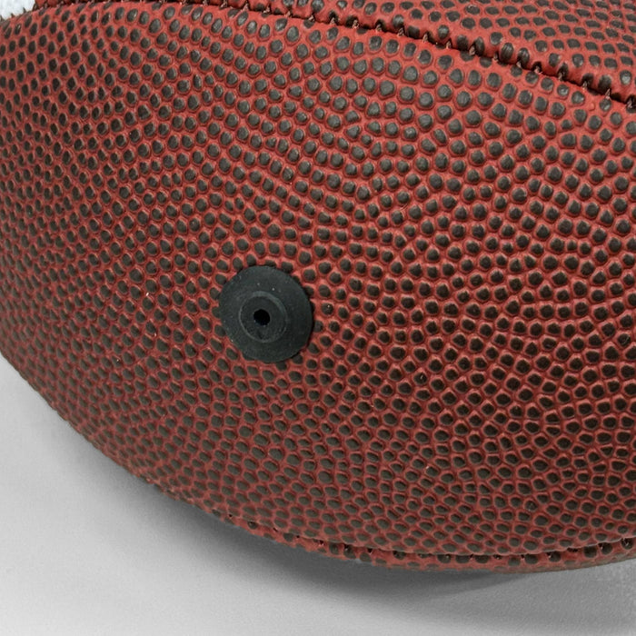 Mini Promotional American Football - A mini promotional American football in red with a textured surface and a black valve.
