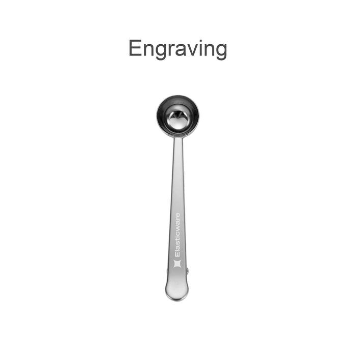 Coffee Measuring Spoon With Clip - A stainless steel coffee measuring spoon with a clip, featuring a branded logo.
