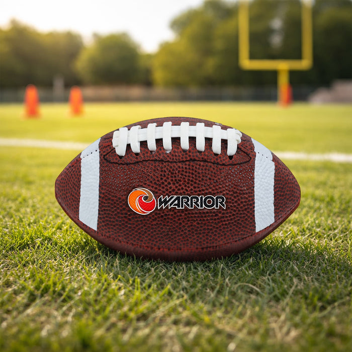 Mini Promotional American Football - A mini promotional American football in brown with white stripes, featuring a logo, on a grassy field.