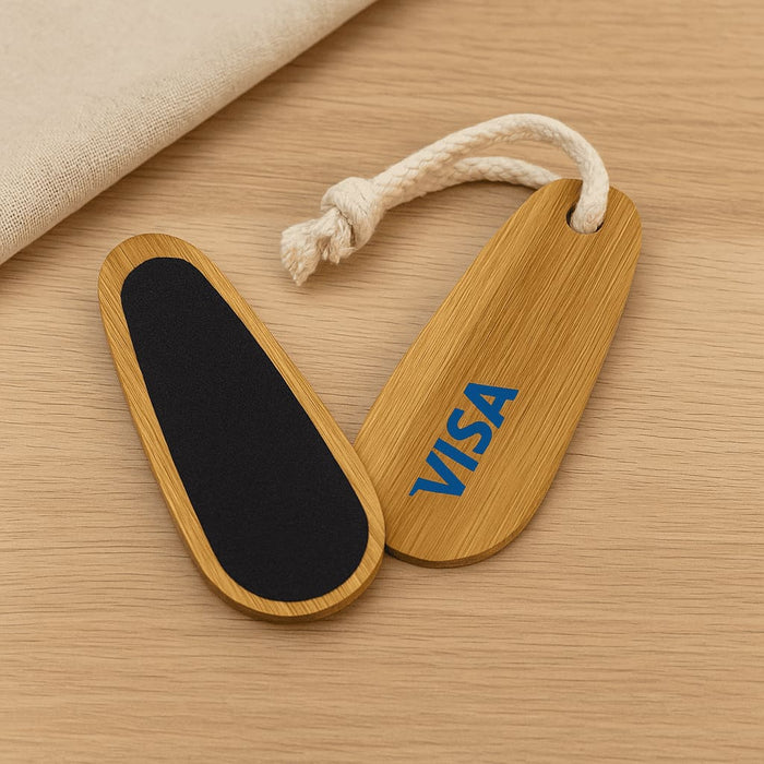 Bamboo Paddle Nail File - A bamboo paddle nail file set with a natural wood finish and black accents, featuring a rope handle and a logo.