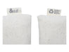 Calico Travel Set - A cream-coloured pouch made of textured material, featuring tags with logos on either side.