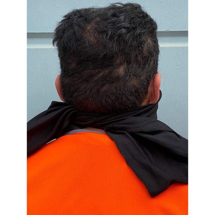 Cooling Towel - A person wearing an orange shirt with a black cooling towel tied around their neck, viewed from the back.