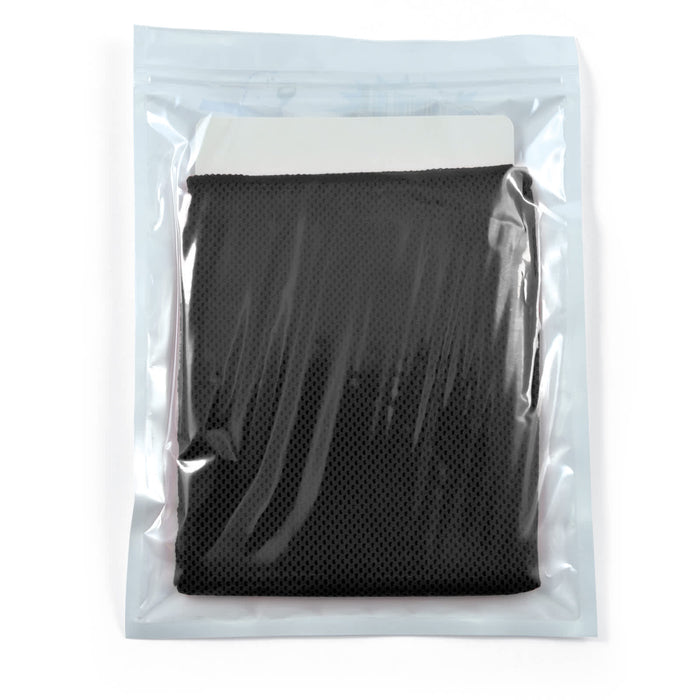 The Game Day Pack - A black cooling towel packaged in a clear pouch, featuring a simple design and a branded logo.