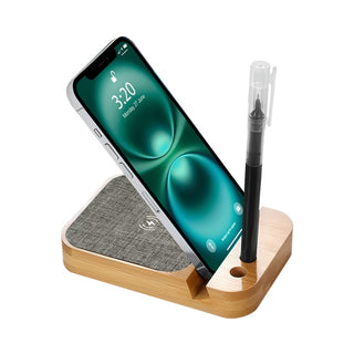 Apollo Eco 15W Wireless Charger Cable Kit - A wooden wireless charger with a grey fabric pad, holding a smartphone and a pen. It features a logo on the base.