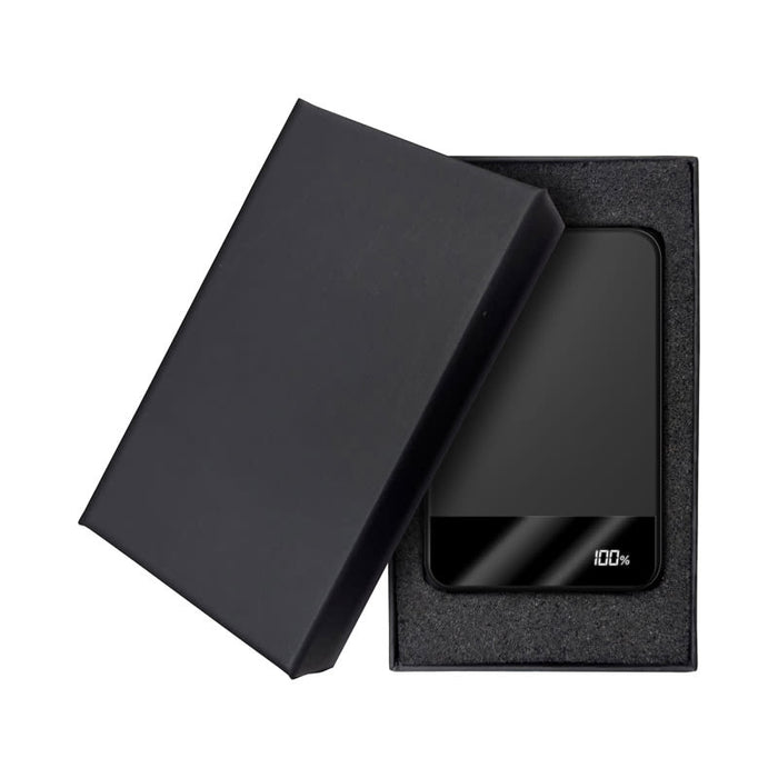 Apex Semi-Solid-State 22.5W MagSafe Wireless Power Bank - 5000 mAh (Stock) - A black MagSafe wireless power bank is displayed inside a black box, featuring a sleek design and an LED charge indicator.