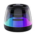 Pacific Magnetic Bluetooth Speaker Stand with RGB LED Light (Stock) - A Bluetooth speaker stand in black with a transparent casing featuring vibrant RGB LED lights.