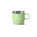 Stackable Stainless Steel Mug - A stackable stainless steel mug in a pastel green shade with a silver rim and a sturdy handle.