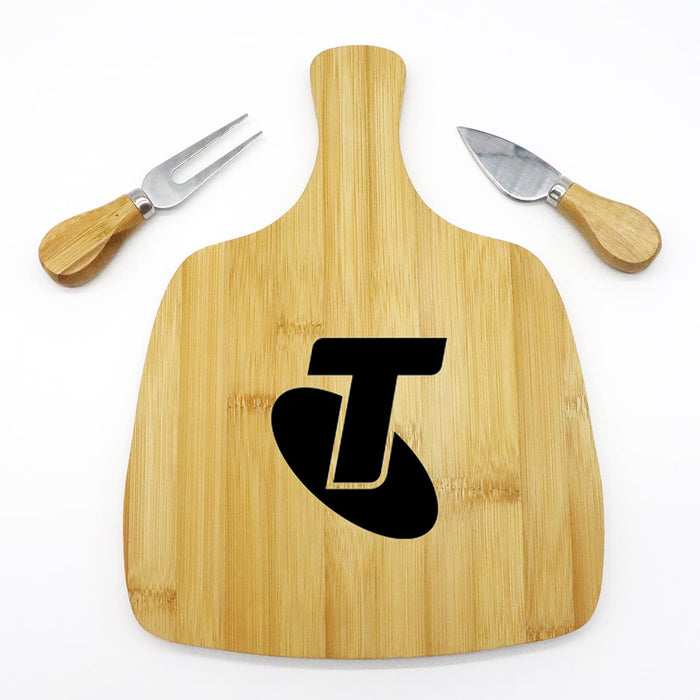 Artis Cheeseboard & Knife Set - A bamboo cheeseboard with a logo and two stainless steel knives featuring wooden handles.