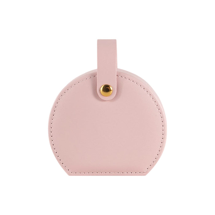Small Portable PU Leather Jewellery Box - A small portable jewellery box in soft pink PU leather, featuring a rounded design and a gold fastener.
