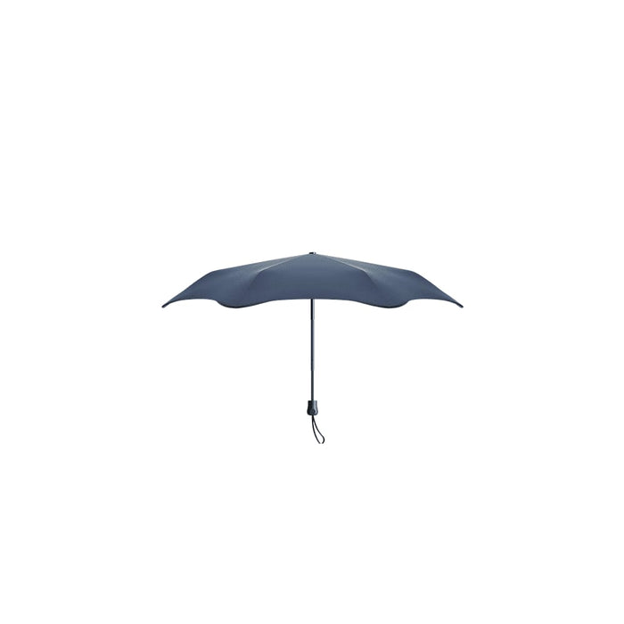 BLUNT Neo Umbrella - A navy blue umbrella with a curved shape and a black handle, featuring a branding logo on the handle.