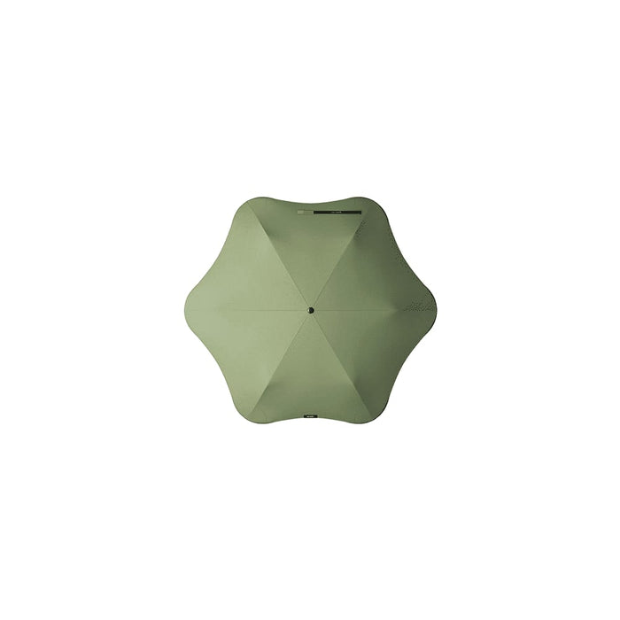 BLUNT Neo Umbrella - A green umbrella with a unique star-shaped design, featuring a central handle and a subtle branding logo.