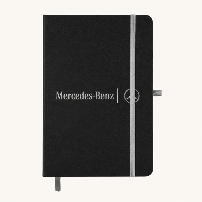 Discovery A5 Notebook - A black A5 notebook with an elastic closure and a logo on the front, featuring a grey band and bookmark.