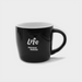 The Maxwell 330ml Ceramic Mug - A black ceramic mug with a curved design and a handle, featuring a logo on the front.