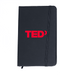 Minichroma A6 Notebook - A black notebook with an elastic band closure and a red logo on the front.