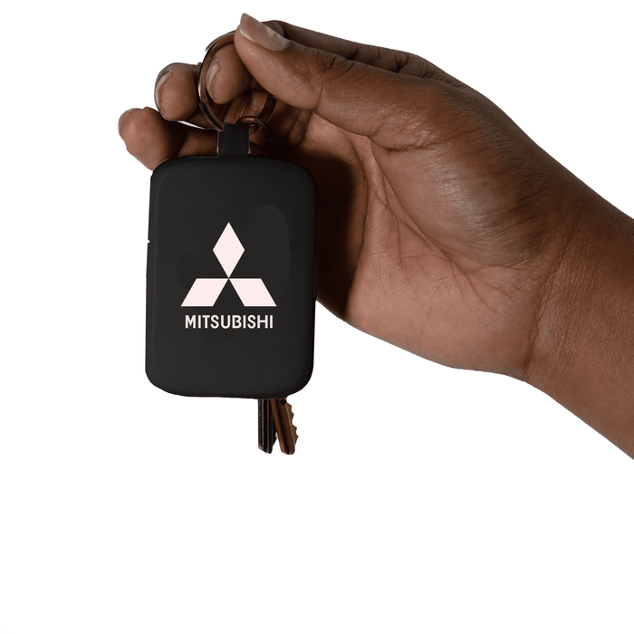 Neo Keychain Powerbank 2000mAh - A black keychain power bank held in a hand, featuring a logo on the front and some keys attached.