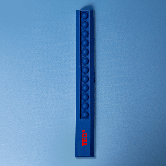 30cm Popper Ruler - A blue popper ruler with multiple poppable buttons and a branded logo on one side.