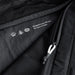 Bellroy Lite Packing Cube 12L - A black packing cube with a mesh panel and zip closure, featuring a subtle logo and design details.