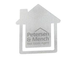 Biz Clip - House (Replaced by Indent C4754-EI) - A metallic business card holder shaped like a house with a logo and branding on the surface.