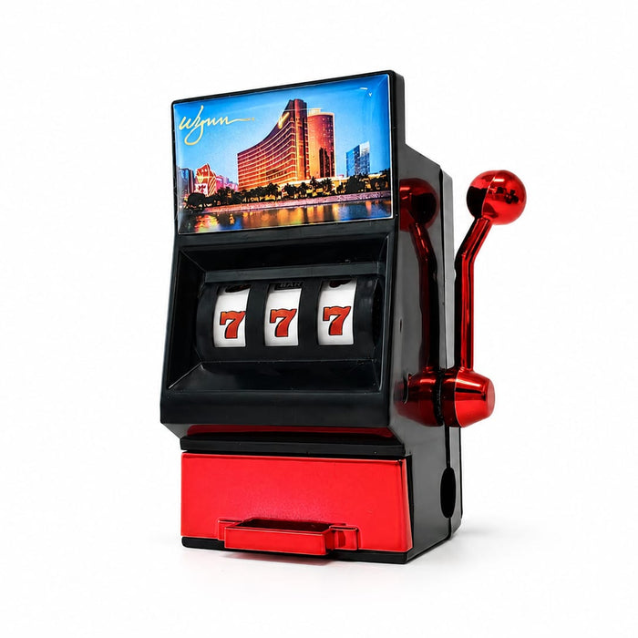777 Slot Machine Fridge Magnet with Sharpener - A 777 slot machine fridge magnet in red and black, featuring a glossy front with a lever and branding.