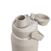 CamelBak - Thrive Chug VSS 1.0L - A drink bottle in a muted beige colour, featuring a wide mouth opening and a flip-top lid with a logo.