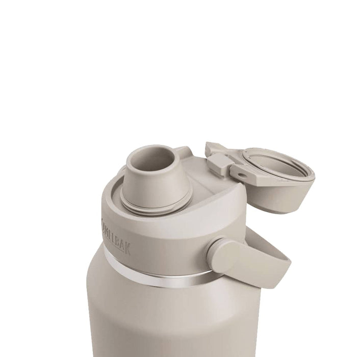 CamelBak - Thrive Chug VSS 1.2L - A drink bottle in a light beige colour with a screw-on lid and a built-in straw. Features a logo.