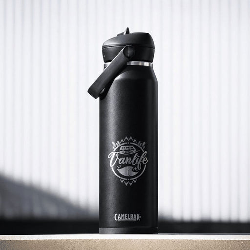 CamelBak - Thrive Flip Straw VSS 1.0L - A drink bottle in matte black with a flip straw lid and a logo featuring a vanlife theme.