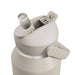 CamelBak - Thrive Flip Straw VSS 1.2L - A drink bottle in beige with a flip straw lid and a side handle, featuring a logo.
