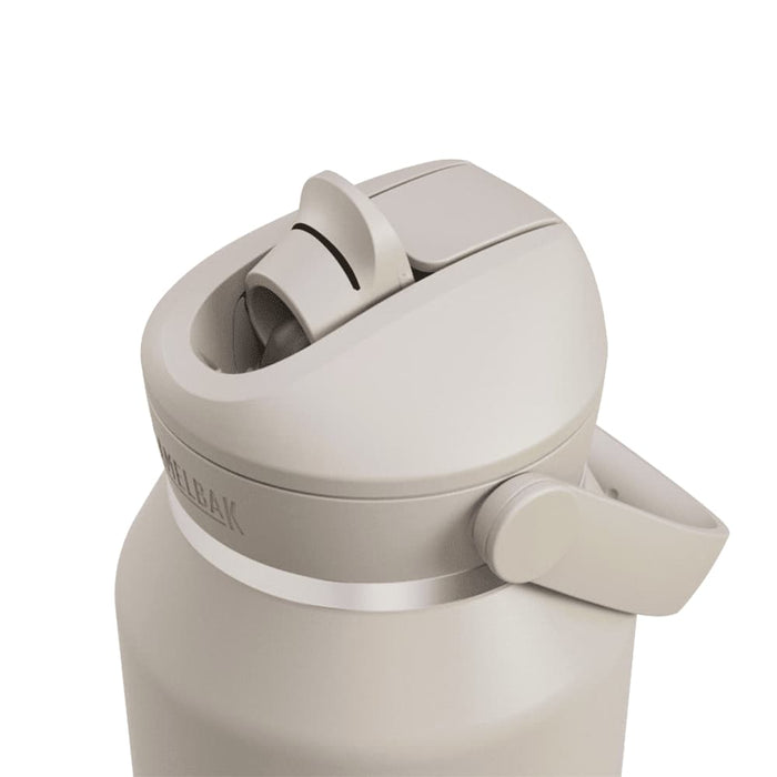 CamelBak - Thrive Flip Straw VSS 1.2L - A drink bottle in a light beige colour with a flip straw lid and a side handle. It features a logo on the side.