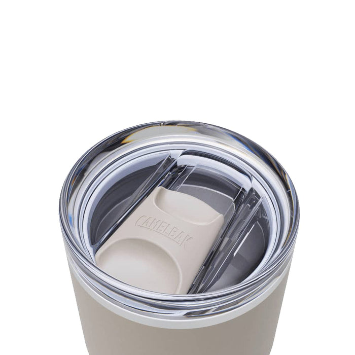 CamelBak - Thrive Tumbler VSS 0.6L - A drink bottle with a lid featuring a clear top and beige elements, showcasing a sleek, modern design.